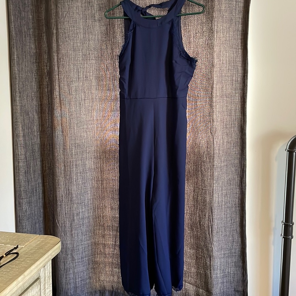 Mid calf beautiful navy with lace design romper. From Francesca’s!